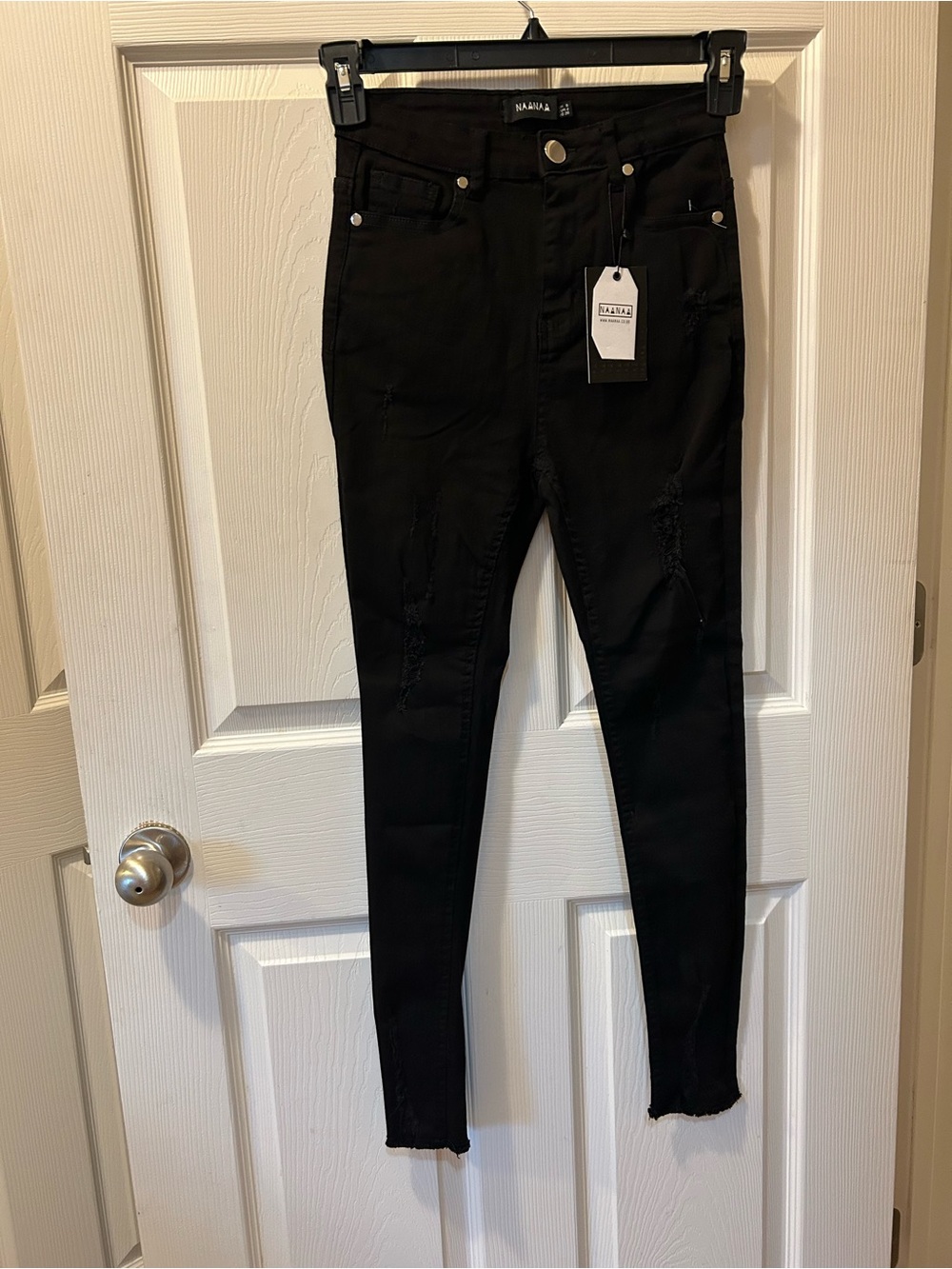 NAANAA Size 8 Black Skinny Jeans with Subtle Distress NWT